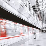 driving train on platform in the station building